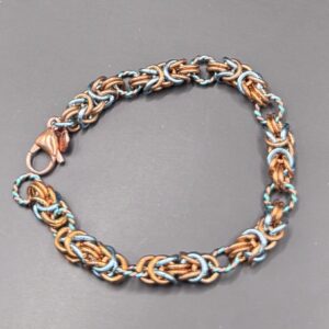 Byzantine lucky penny, light blue, with twisted rings